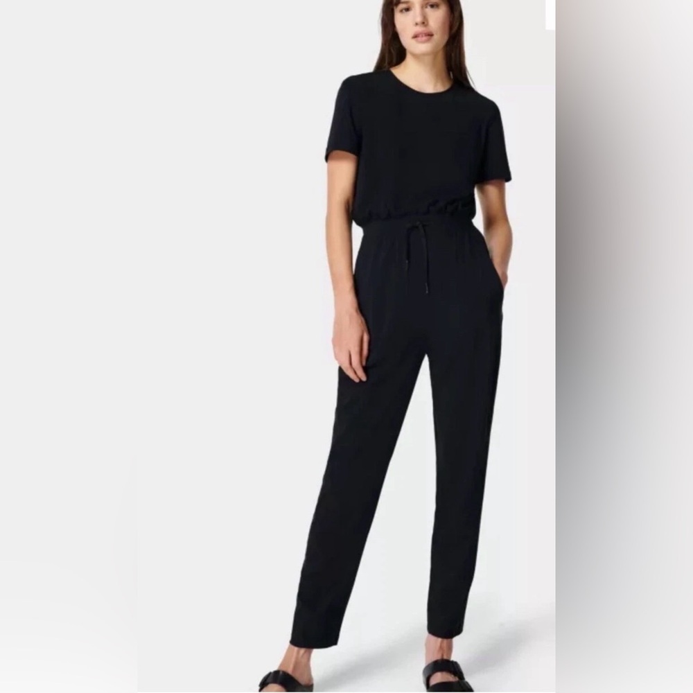 NWT SWEATY BETTY EXPLORER JUMPSUIT BLACK SZ 4​